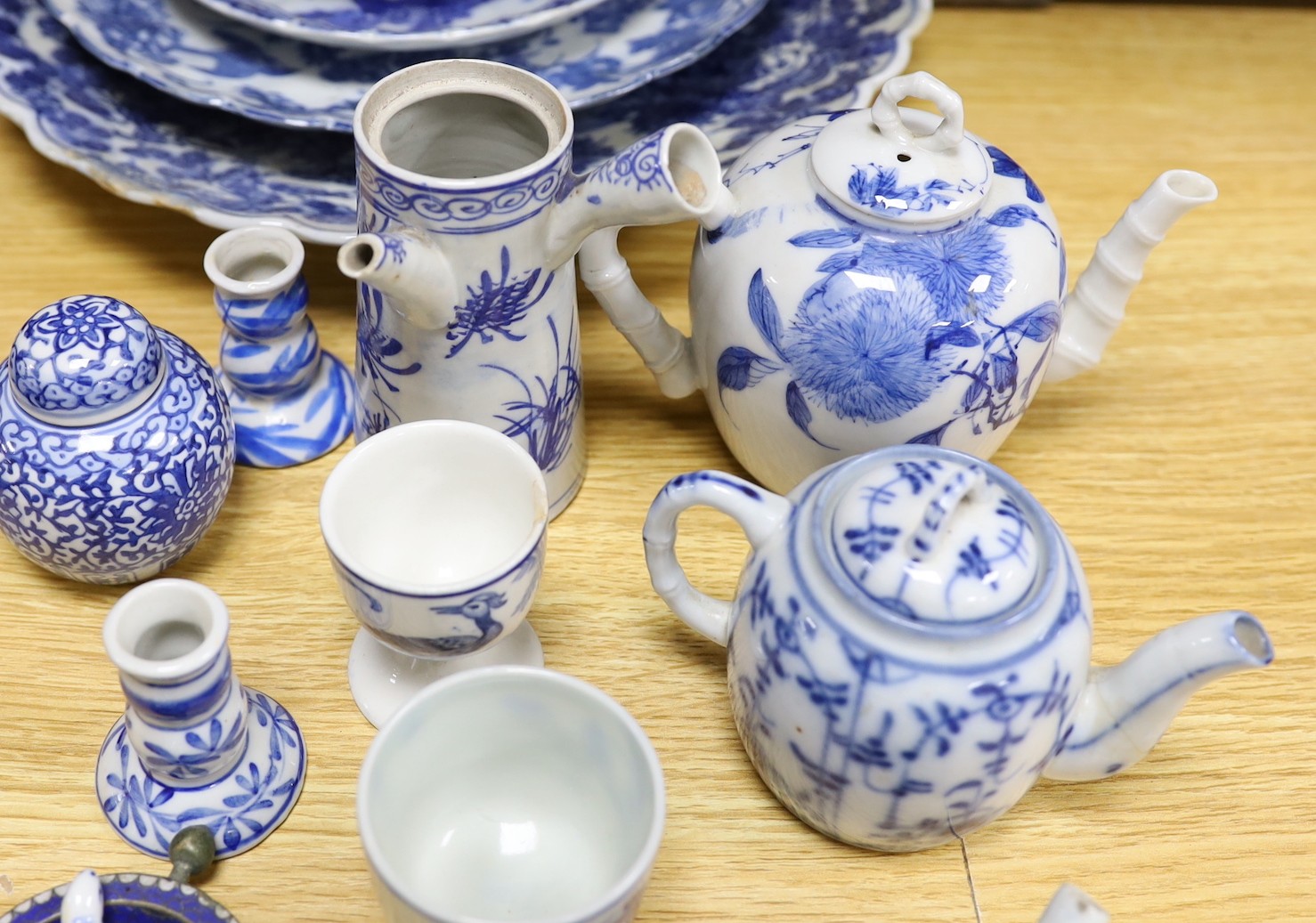 A collection of mostly Japanese blue and white ceramics, late 19th/early 20th century, including a Seto two handle vase, 27 cm high